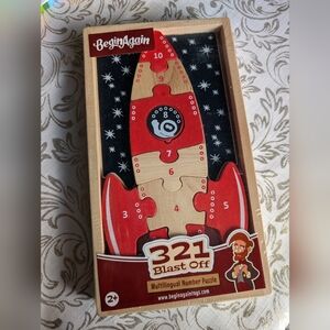 321 Blast Off Multilingual Number Puzzle - Red and Natural Wood